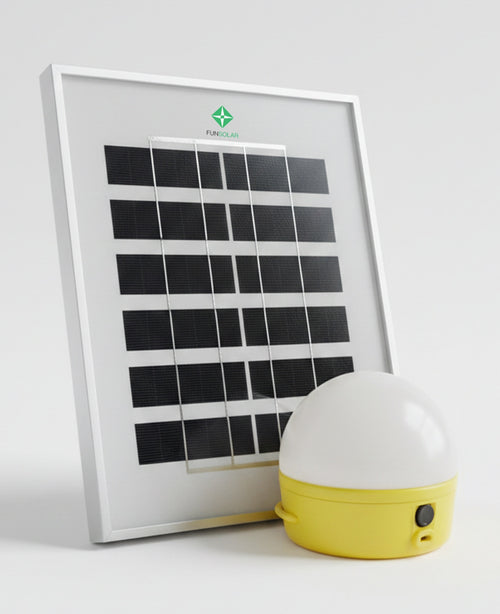 Solar panel and portable light on a white background